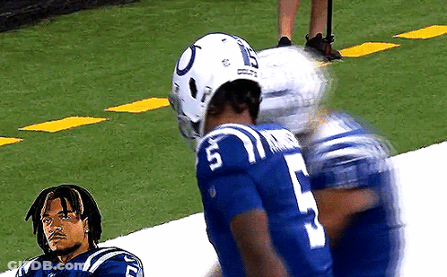 Football Player Number 5 Talking To Another Player GIF