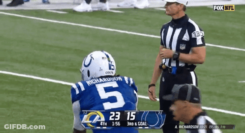 Football Player Number 5 Talking To Referee GIF