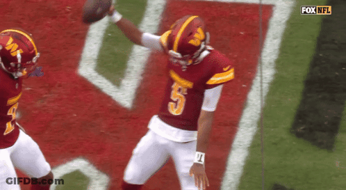 Football Player Number 5 Throws Ball GIF