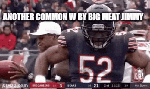 Football Player Number 52 Holding Football GIF