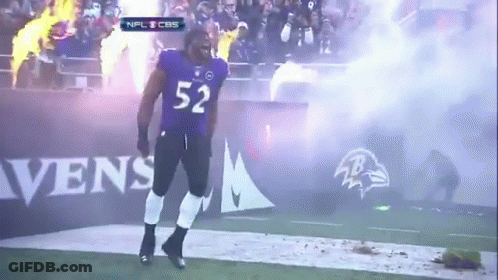 Football Player Number 52 Walking On Field GIF