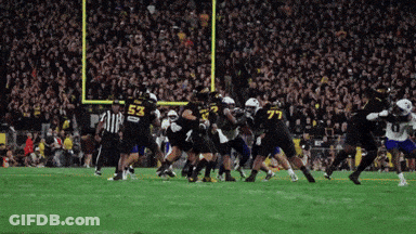 Football Player Number 53 Being Tackled GIF