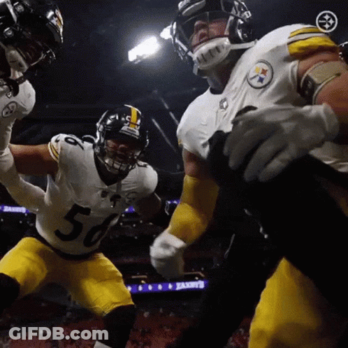 Football Player Number 56 Being Tackled GIF