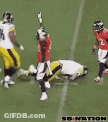 Football Player Number 58 Being Tackled GIF