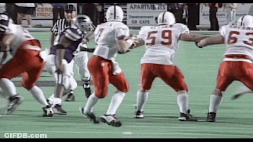 Football Player Number 59 Being Tackled GIF
