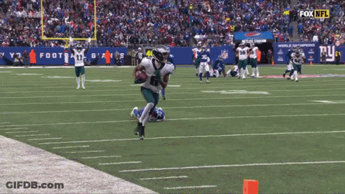 Football Player Number 6 Holding Football GIF