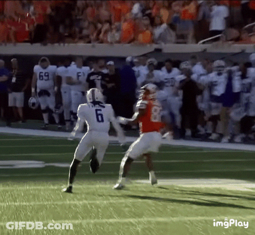 Football Player Number 6 Running Toward Player Number 8 GIF