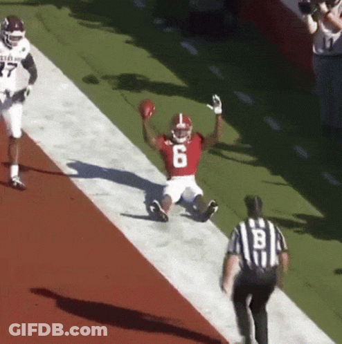 Football Player Number 6 Sliding Down Field GIF