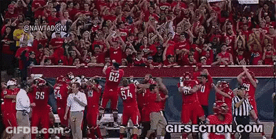 Football Player Number 62 In Front Of Crowd GIF