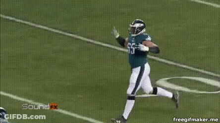 Football Player Number 65 Sitting On Bench GIF