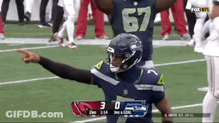 Football Player Number 67 Pointing GIF