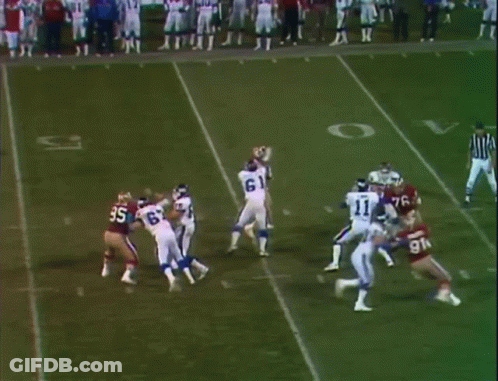 Football Player Number 69 Being Tackled GIF