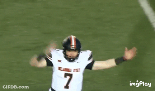 Football Player Number 7 Arms Outstretched GIF