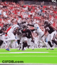 Football Player Number 7 Being Tackled GIF