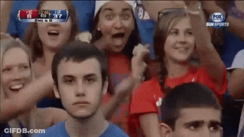 Football Player Number 7 Being Tackled GIF