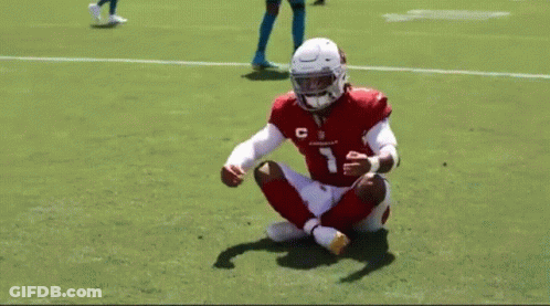 Football Player Number 7 Sitting On Grass GIF