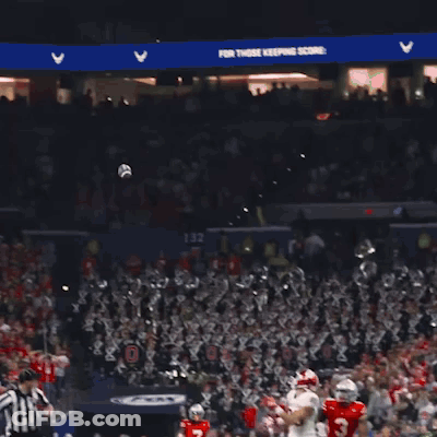 Football Player Number 7 Tackled GIF