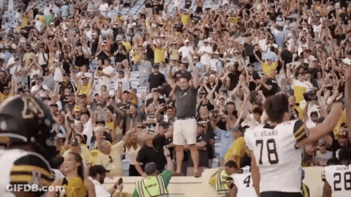 Football Player Number 78 Jersey In Front Of Crowd GIF