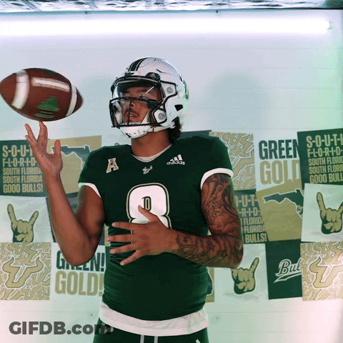 Football Player Number 8 Throws Ball GIF