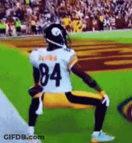 Football Player Number 84 Kneeling On Field GIF