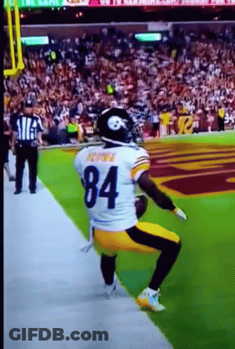 Football Player Number 84 Kneeling On Field GIF