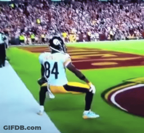 Football Player Number 84 Kneeling On Field GIF