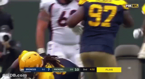 Football Player Number 85 Laying On Ground GIF