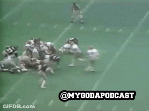 Football Player Number 88 Surrounded By Players GIF