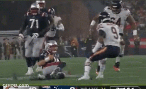 Football Player Number 9 Kneeling Down GIF