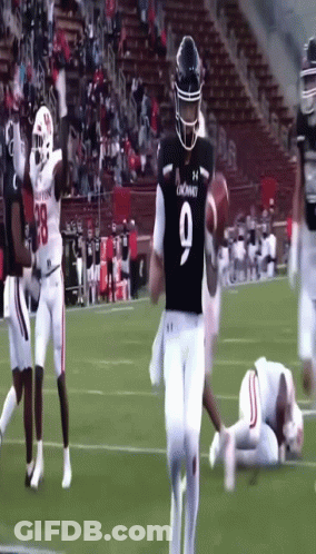 Football Player Number 9 Running On Field GIF