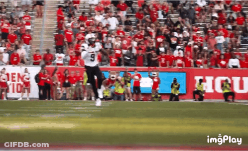 Football Player Number 9 Running On Field GIF