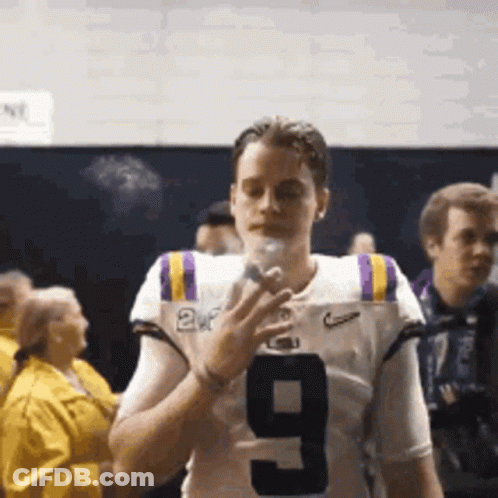 Football Player Number 9 Smoking GIF