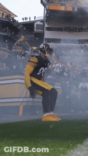 Football Player Number 90 Jumping GIF