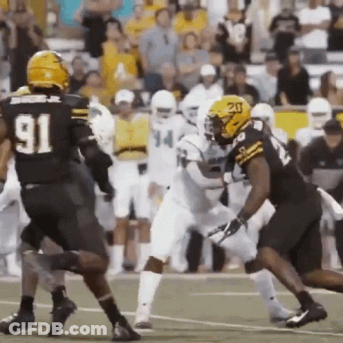 Football Player Number 91 Being Tackled GIF