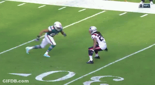Football Player Number 94 Running On Field GIF