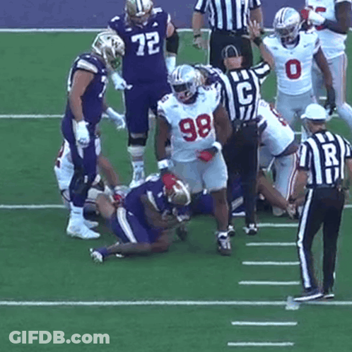 Football Player Number 98 Being Tackled GIF