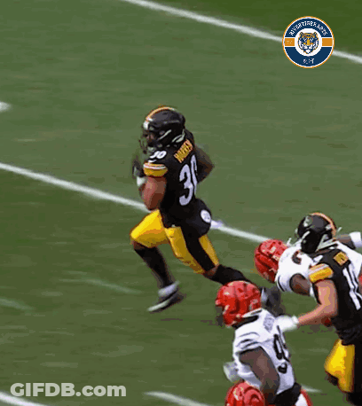Football Player Number 99 Running On Field GIF