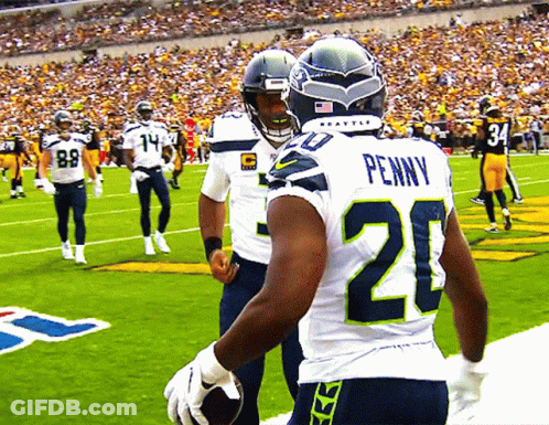 Football Player Penny On Back GIF