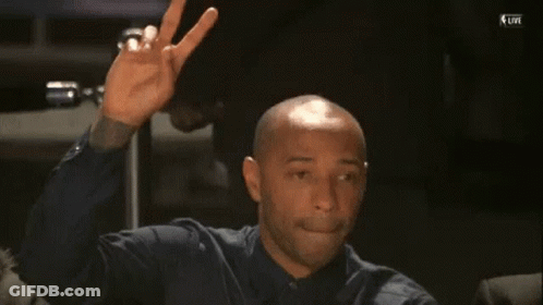 Football Player Red Banner Saying Touchdown GIF