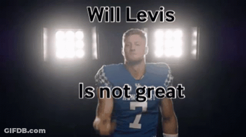 Football Player Running In Front Of NFL Logo Wall GIF