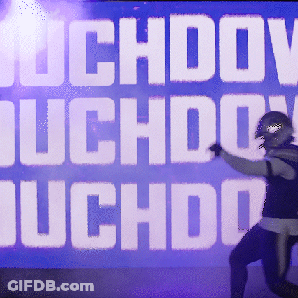 Football Player Running In Front Of Suchdov Suchdo Sign GIF