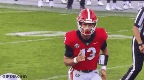 Football Player Running In Red And White GIF