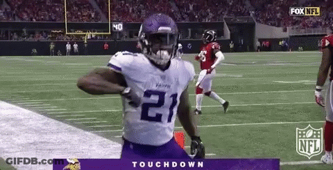 Football Player Running On Field In Purple Jersey Number 21 GIF