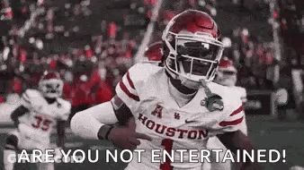 Football Player Running On Field With Crowd GIF