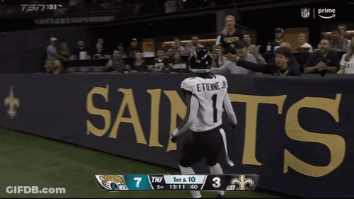 Football Player Running On Field With Scoreboard Saying TNF GIF