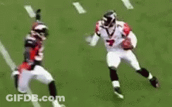 Football Player Running Towards Another Player GIF
