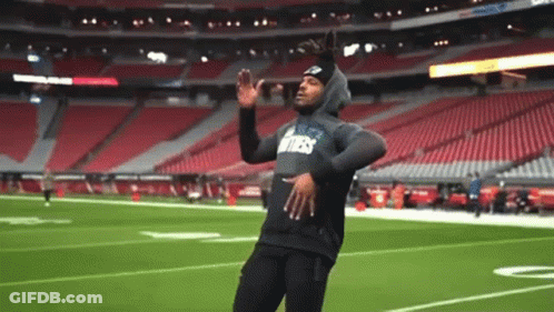Football Player Running With Ball Being Tackled GIF