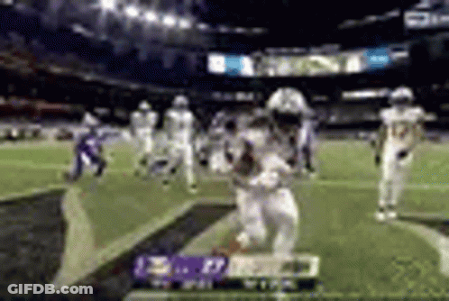Football Player Running With Ball In Stadium GIF