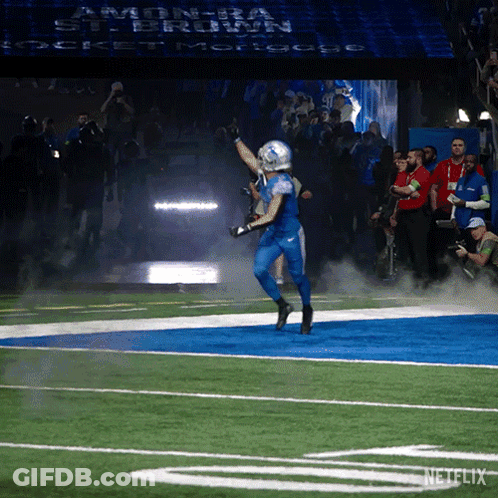 Football Player Running With Netflix GIF