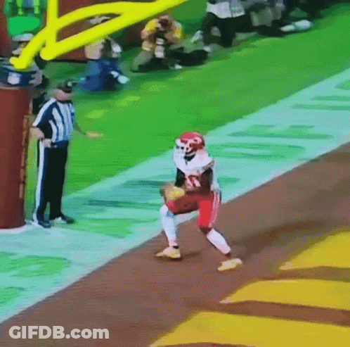 Football Player Running With Referee GIF